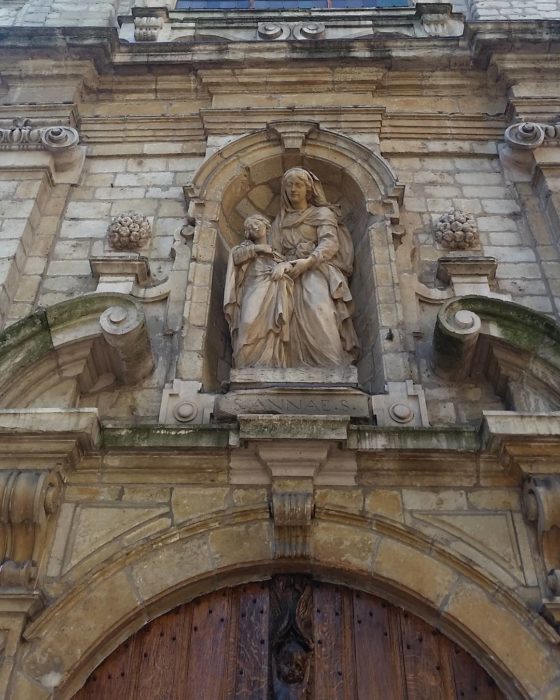 A statue over a chapel door