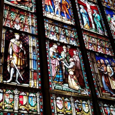 Stained glass representing medieval scenes