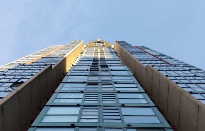 Symmetrical building partly in shadow