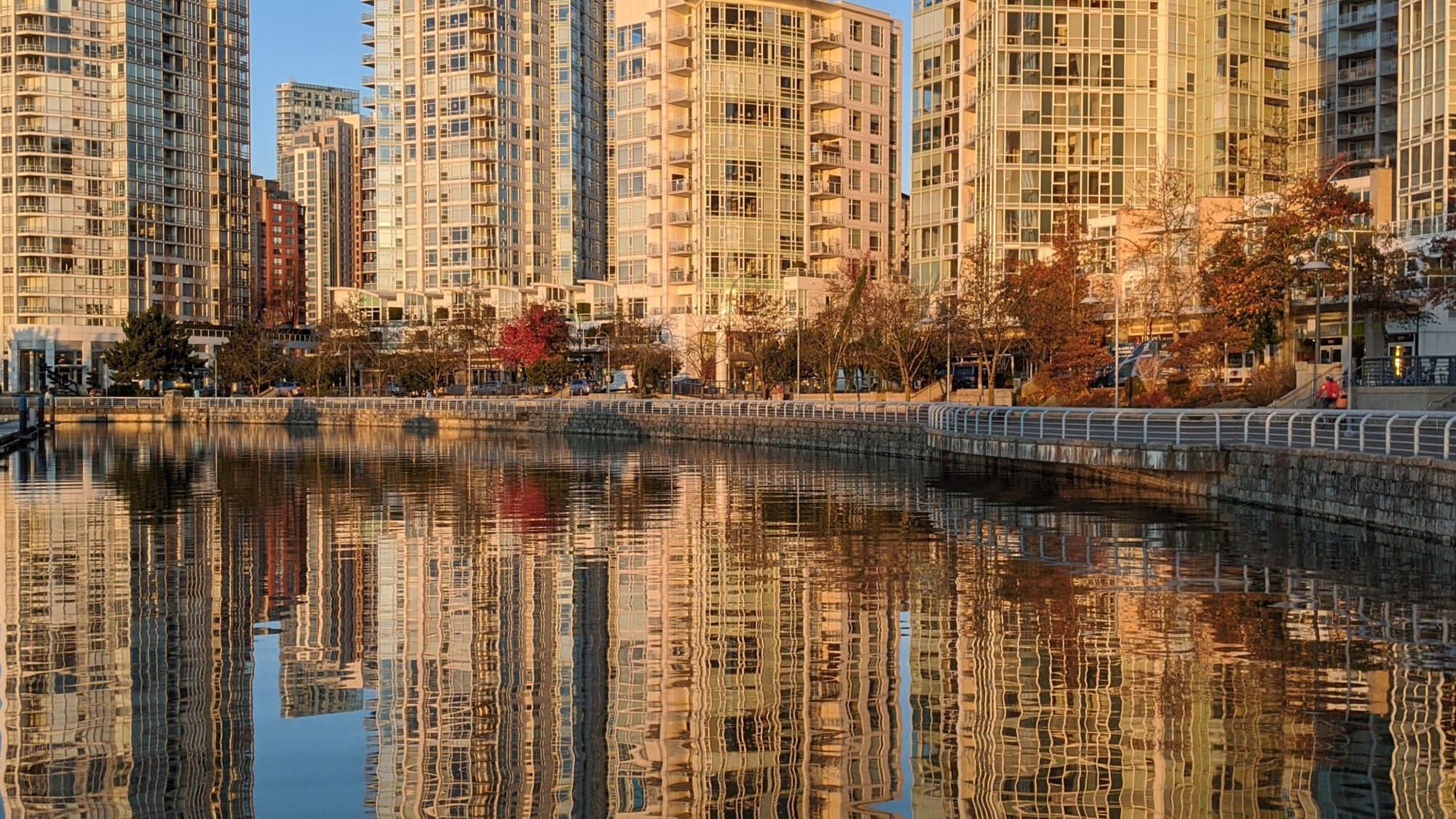 Reflected towers on seawall