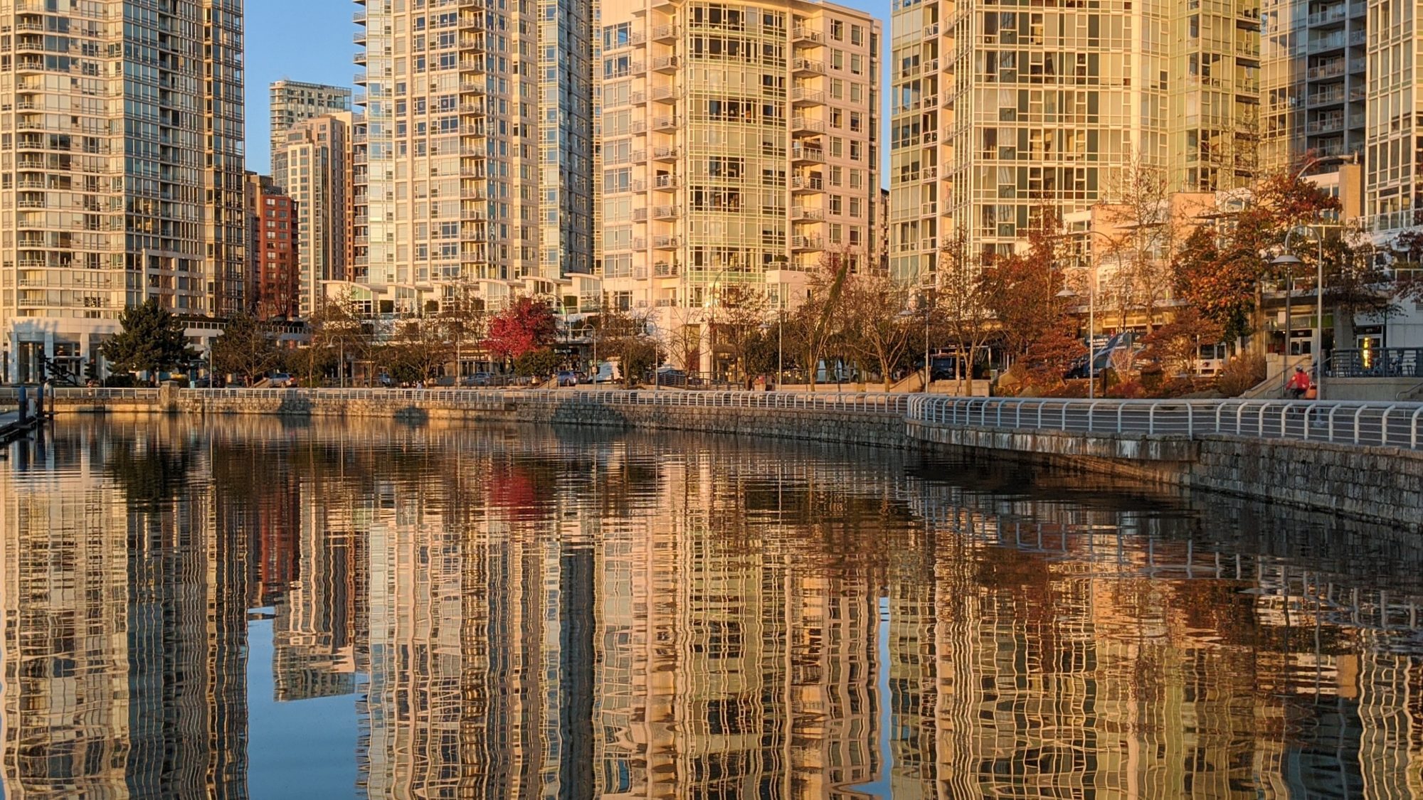 Reflected towers on seawall