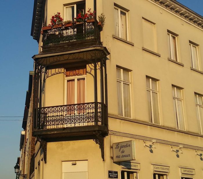 An old building with pretty flowered windows