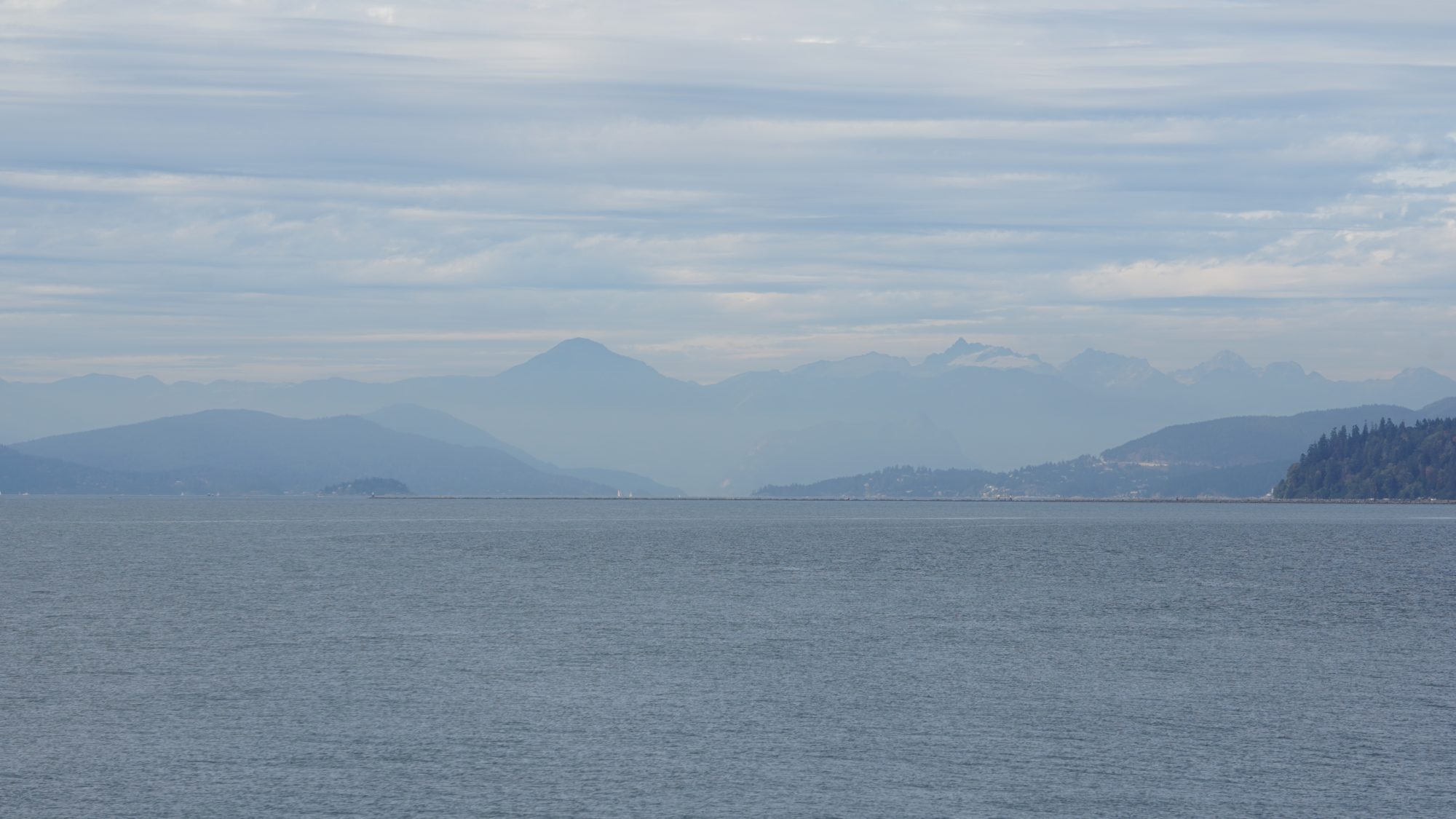 Soft blue mountains and clouds