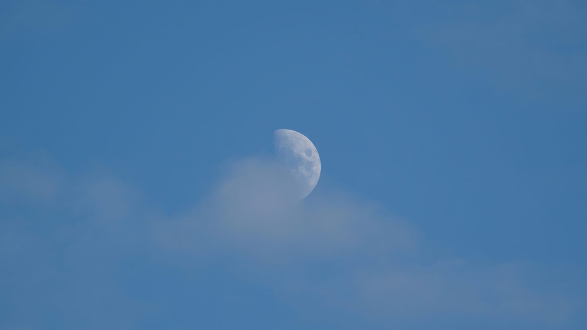 Half moon and cloud