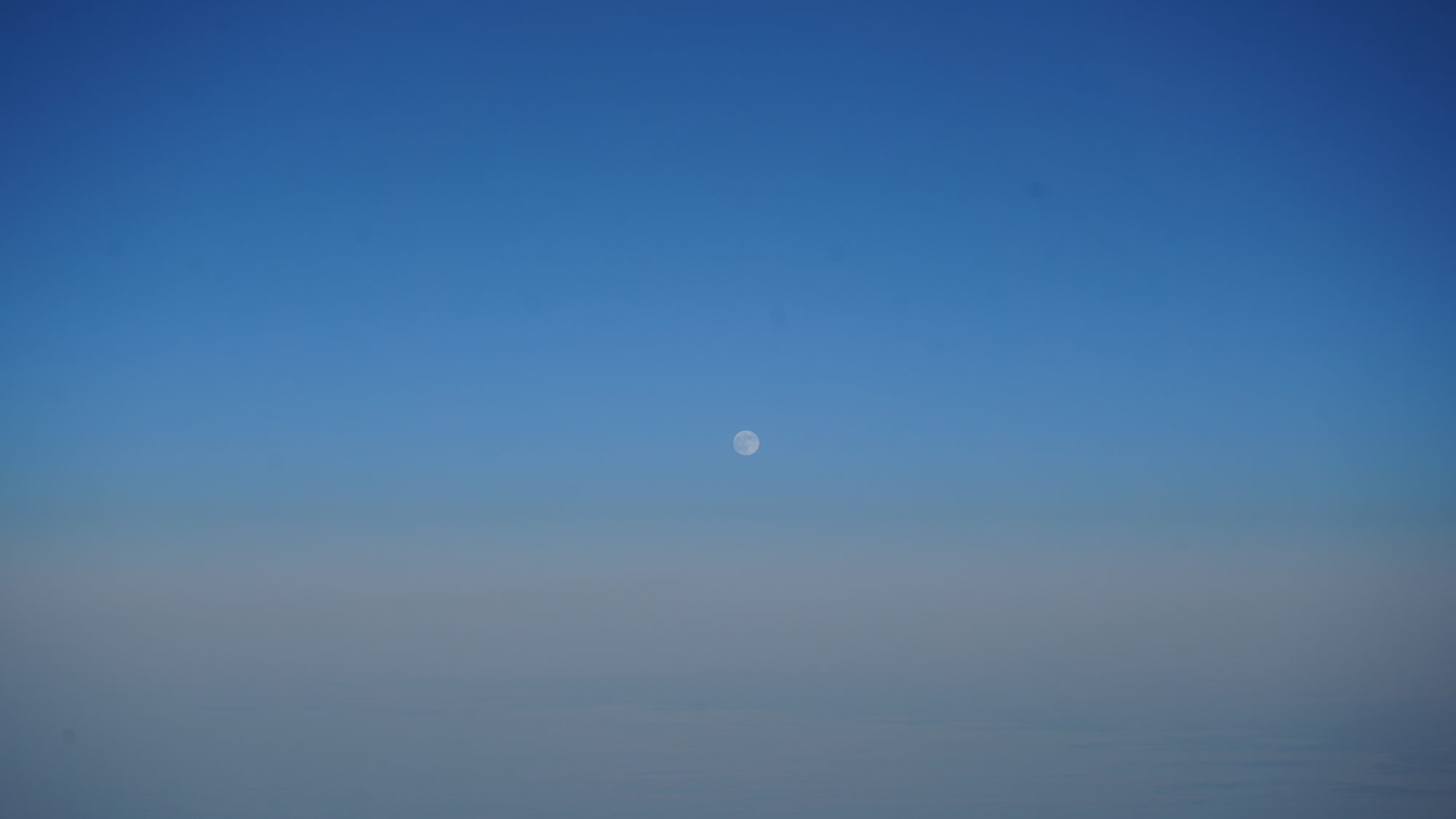 Full moon over clouds