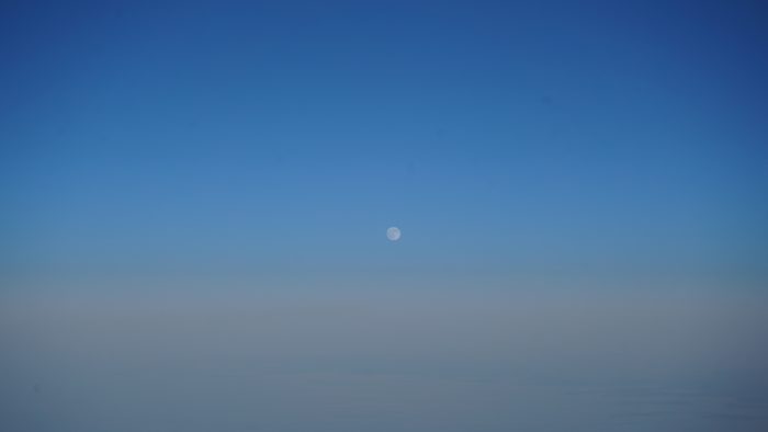 Full moon over clouds