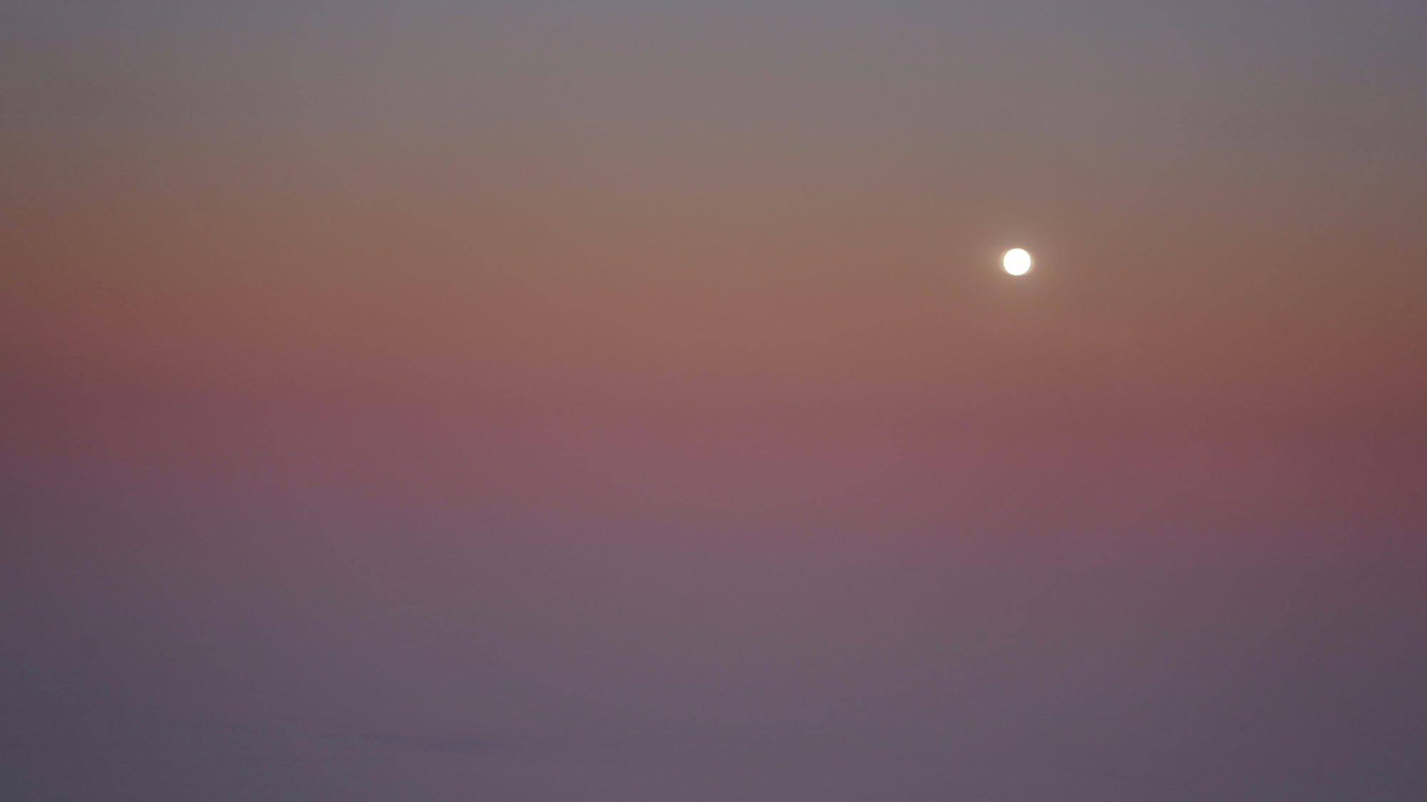Full moon and sunset