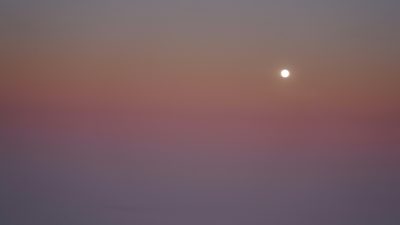 Full moon and sunset