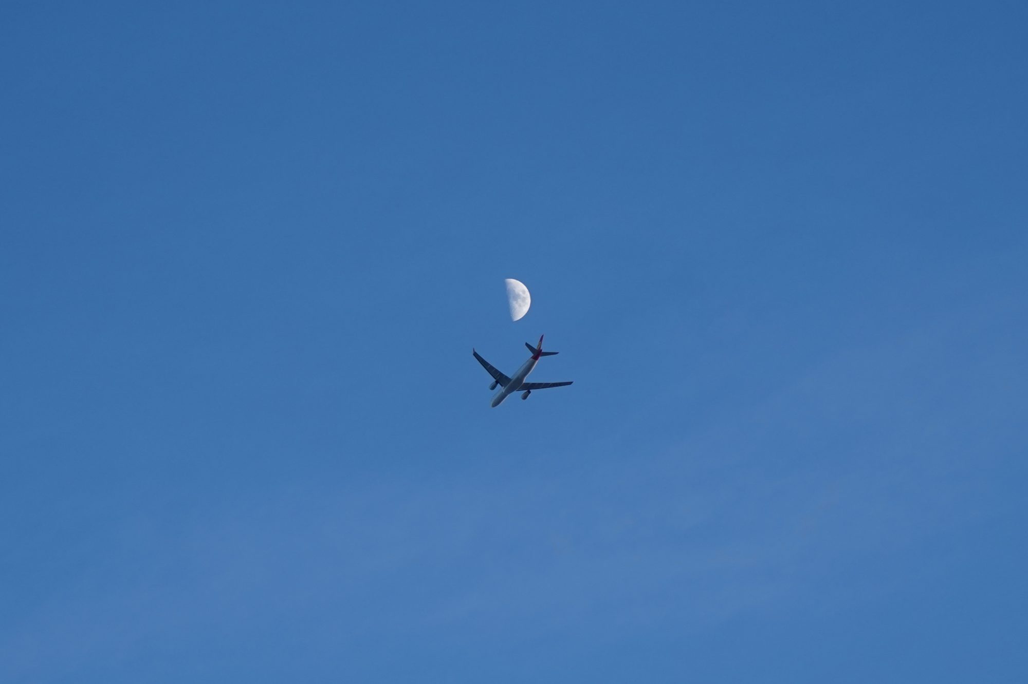 Plane and moon