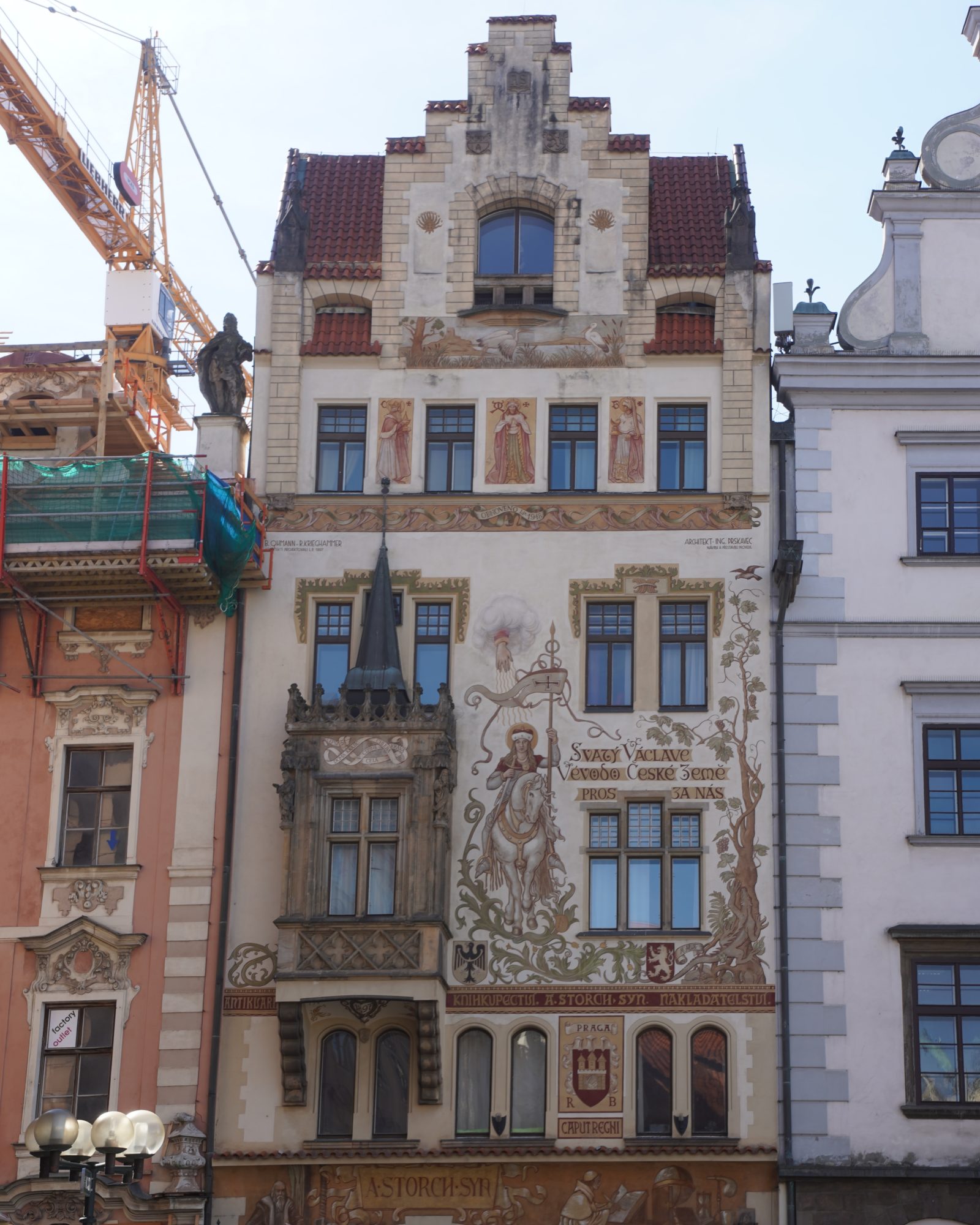 A house with a Gothic balcony and elaborately painted façade