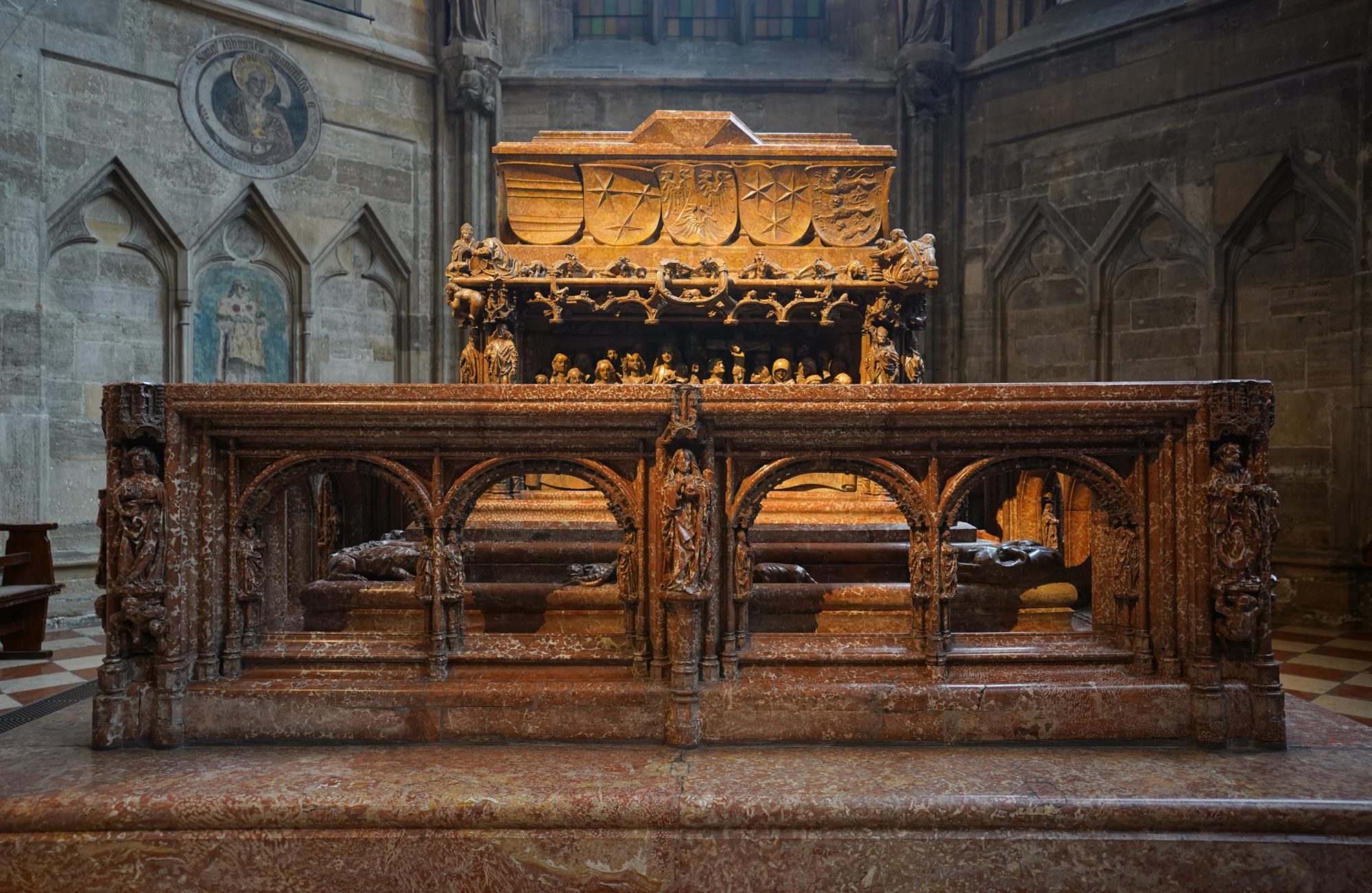 Tomb of Frederick III, an elaborately decorated mausoleum in reddish marble