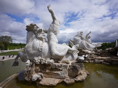 A mer-man statue riding a mer-horse