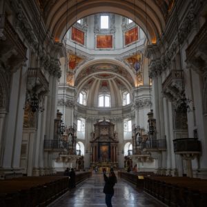Shooting inside Salzburg Cathedral. Someone else is in the centre of the aisle also taking a picture with their phone