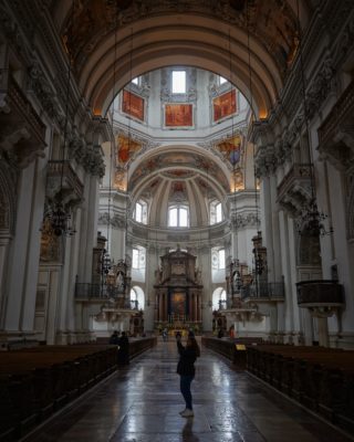 Shooting inside Salzburg Cathedral. Someone else is in the centre of the aisle also taking a picture with their phone