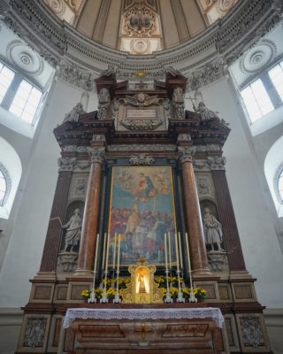 The altar artwork and a bit of the cupola above