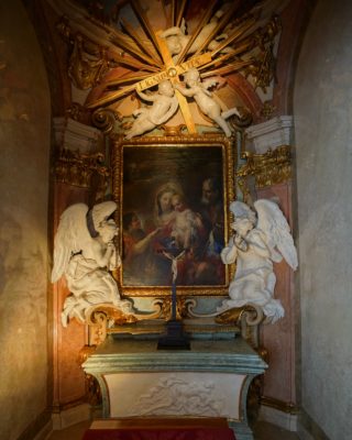 A private altar and prayer spot, with art and statues