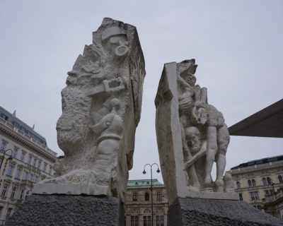 Stone sculpture memorialising victims of war and nazis