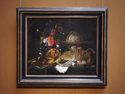 A still life painting with flowers, books and a globe