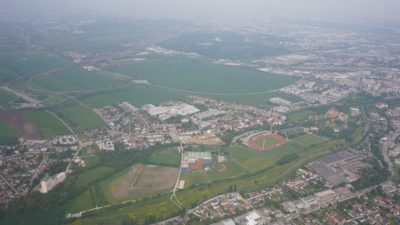 View from above: a football field and some suburbs