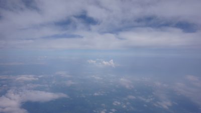 View from a plane, flying between two cloud layers