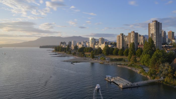 Sunset Beach and West End towers, late afternoon. The sky is blue, with some clouds